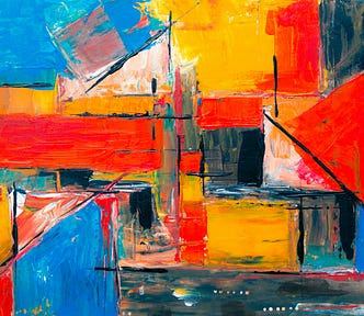 colorful, abstract art in bright reds, yellows, periwinkle, black.