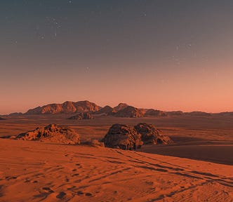 A desert scene that looks like it could be on another planet