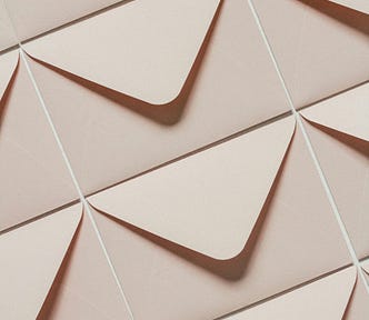 Lots of envelopes arranged in a repeating pattern