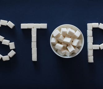 “Stop” written in sugar cubes