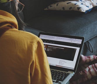 developer uses her laptop.