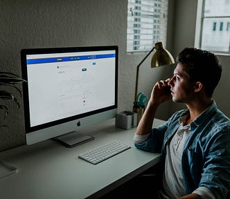 writing, freelance writing, man at desk, man writing, freelancer, writing opportunities