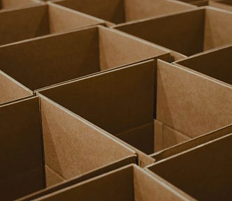Empty boxes laid out in a grid.