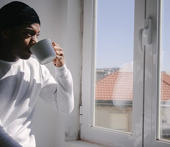 A man drinks coffee alone and stares out his window. It’s about as fun as you’d think.