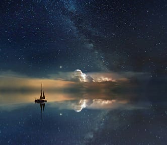 a magical photo of a sailboat on water that is reflected with a cloud pattern. a dark night with an essence of light and lots of stars.