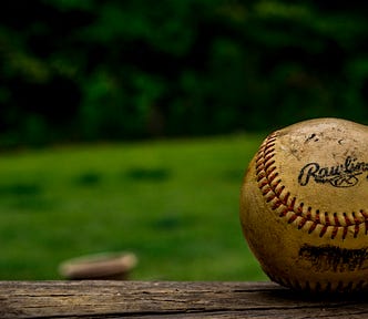 dirty baseball on pitcher’s mound