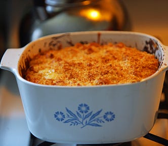 Photo of a small casserole dish of pumpkin casserole.