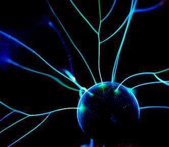 A globe with neon lights emerging from it into blackness.