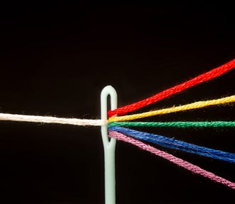 Multiple threads through a needle