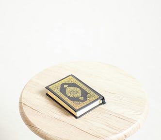 Al Quran on the wood chair