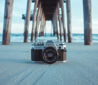 Camera under a pier on a beach