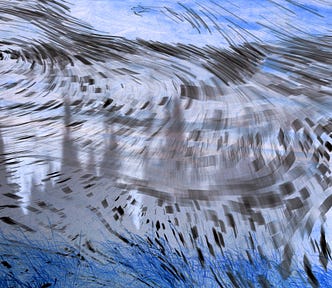 An abstract image of swirling patterns of blue and black.