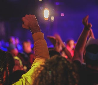 people celebrating at an outside party