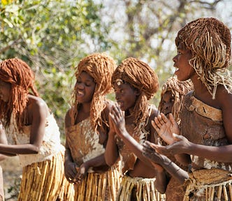 Some women dressed in a cultural attire