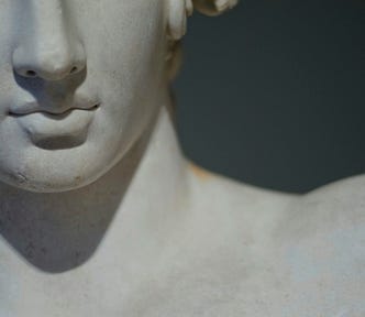 Head and shoulders of a Greek statue