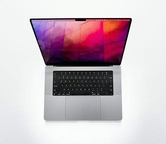 MacBook Pro on a white surface