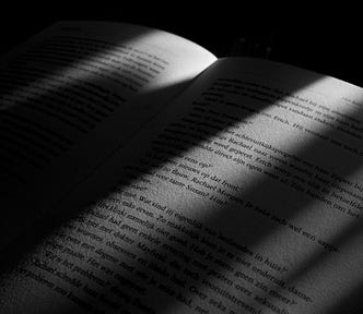 A book in a dimly lit room