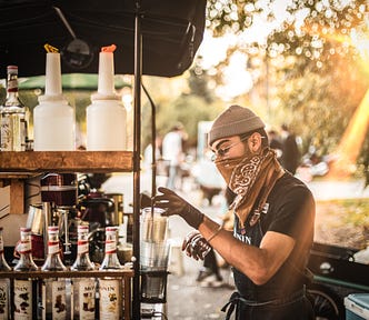 An entrepreneur in North Macedonia selling drinks