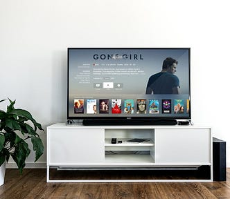 TV with images of shows and movies