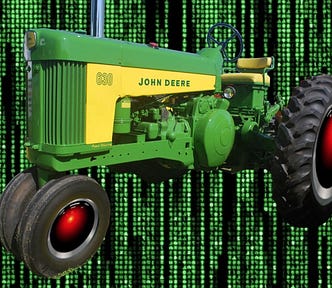 A vintage John Deere tractor whose wheel hubs have been replaced with HAL 9000 eyes, matted over a background of the cyber-waterfall image from The Matrix.