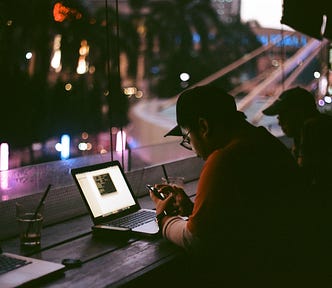 Person working late into the night on their laptop