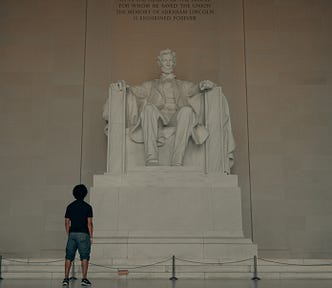Here is a boy gazing up at the statue of President Lincoln at the U.S. National Park Service, reflecting and showing great honor. Are we deserving of honor in the way we live our lives?