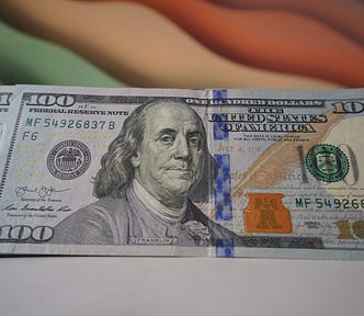 Image of a hundred dollar bills