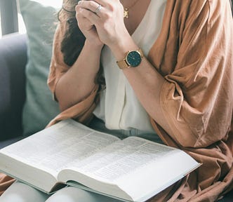 Woman praying and talking to God.