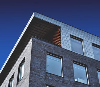 view of a building looking up toward the sky