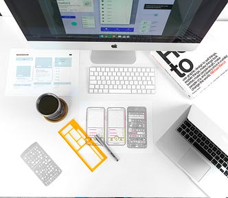 A birds eye view of an organized desk and workspace
