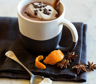 Coffee with cream and orange peel