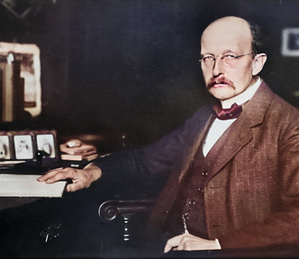 In 1900, Max Planck was trying to find a formula that could reconcile classical theory with the observed spectrum.
