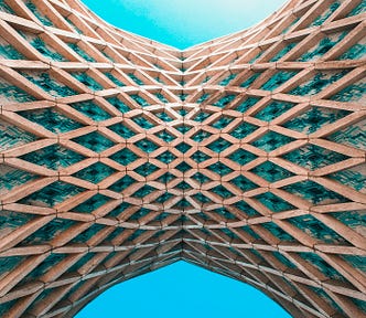 two sculptural cone shaped structures, meeting in the centre