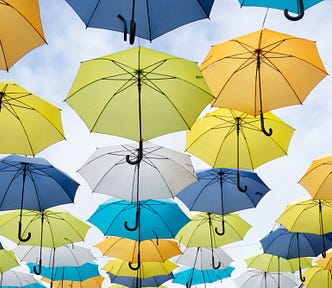 umbrellas against a sky