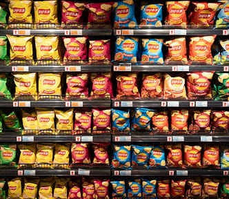 Rows upon rows of junk food, all at an appropriate level for children.