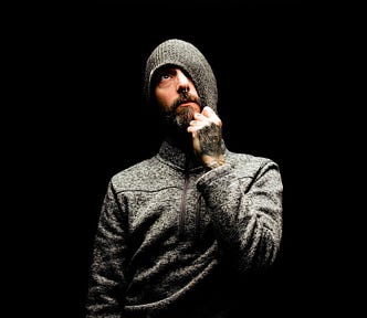 Man In Gray Knit Cap And Gray Sweater