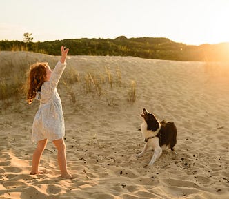 happiness, happy, finding happiness, happy girl on beach with a dog