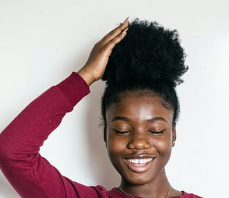 a woman with afro hair