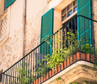 A balcony on a sunny day.