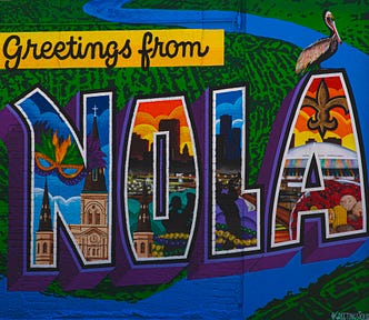Image of an old post card saying: Greetings from NOLA