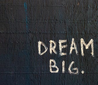 Sign saying “Dream Big.”