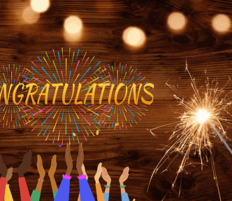 The Challenge Will Be Available Forever by Nancy Blackman, brown wood background with lights overhead and sparkle to right. The word “Congratulations” and hands clapping at bottom. writing challenge