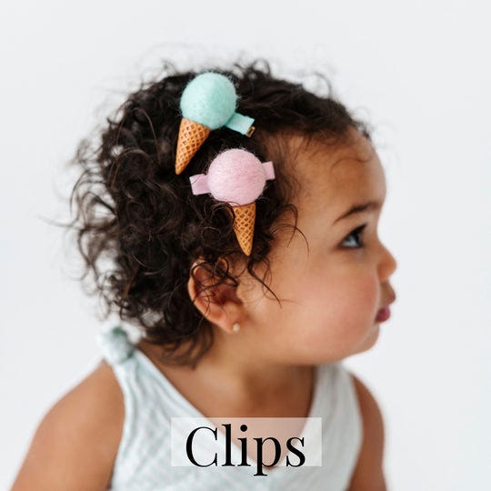 Adorning Your Little One: The Charm and Practicality of Baby Bows  by 