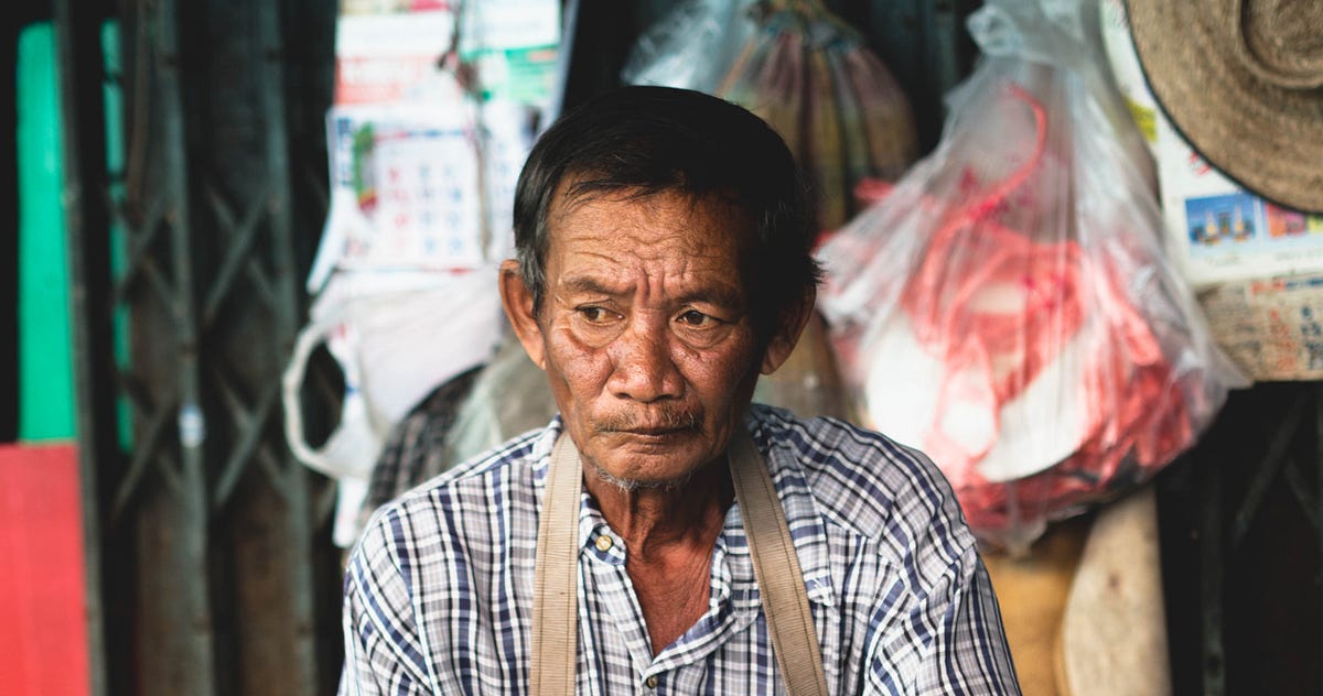 The Fish Cleaner. How long has he been doing this. by Zachary Forrest