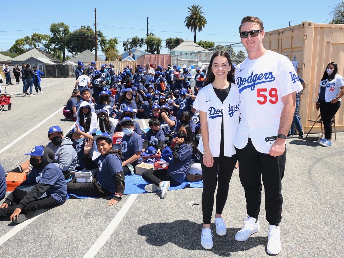 Evan Phillips helps LADF and Shoes That Fit distribute shoes to kids | by  Rowan Kavner | Dodger Insider