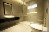 Elevate Your Bathroom Design with Glass Shower and Urinal Partitions