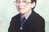 England, 4 years old. Just like Harry Potter, I went to school in an old castle.