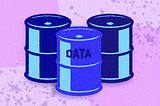 A graphic of three blue barrels on a light purple background. The centre barrel is labelled “data”.