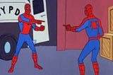 2 Spidermans pointing at each other