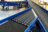 Warehouse Conveyor Systems: Choosing the Right One for Your Facility | Damon